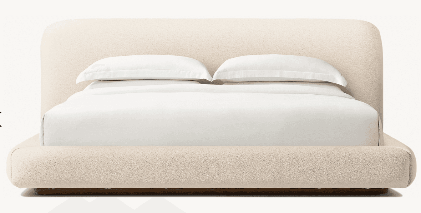 A modern platform bed featuring a fully upholstered frame and a gently rounded headboard, presented… — 3D model