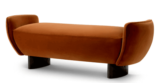 A modern upholstered bench in a warm terracotta velvet, featuring distinctive curved ends and suppor… — 3D model