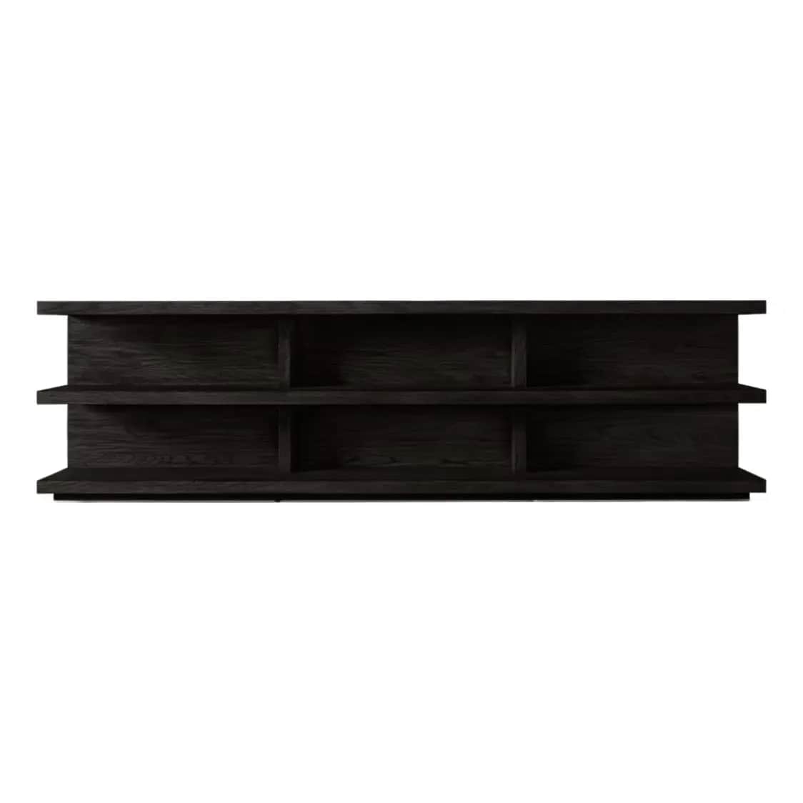 A low, long, dark-colored bookshelf with an open design. It features two horizontal shelves, each di… — 3D model
