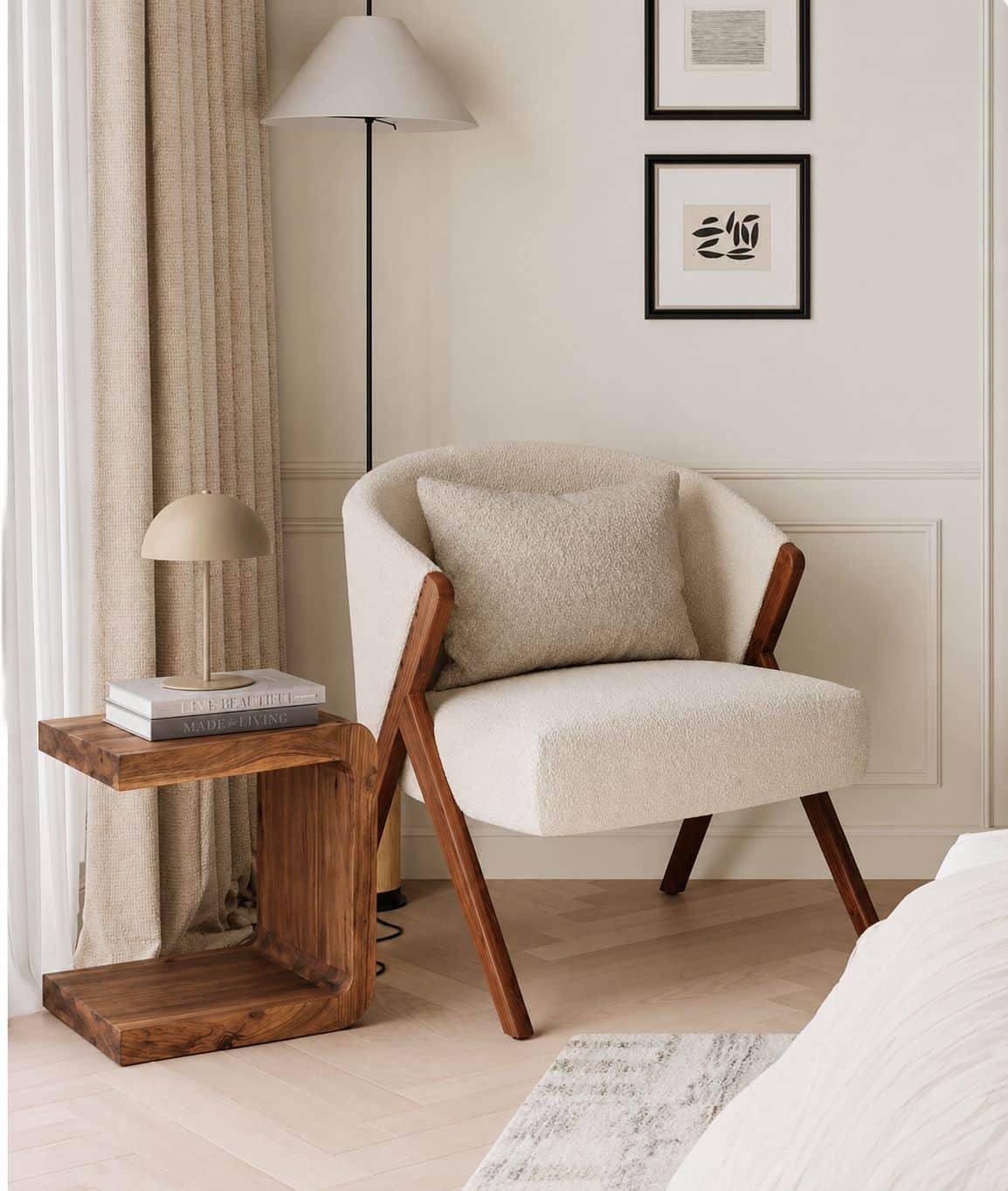 A contemporary armchair featuring an off-white bouclé upholstery and a distinctive exposed dark wood… — 3D model