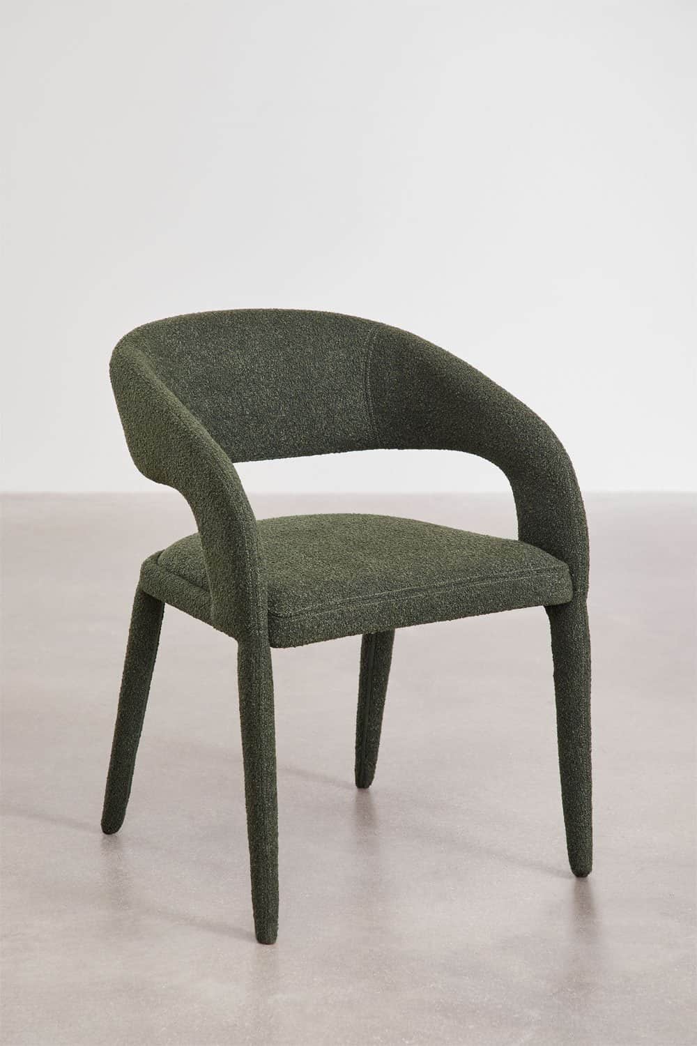An upholstered armchair with a continuous curved back and integrated armrests, all covered in a text… — 3D model