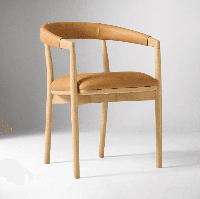 A contemporary armchair with a wooden frame and a tan leather seat and backrest. The chair features… — free BLEND 3D model