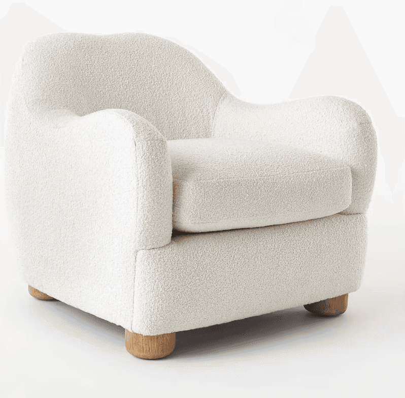 A contemporary armchair fully upholstered in a cream-colored bouclé fabric, featuring a soft, rounde… — free OBJ 3D model