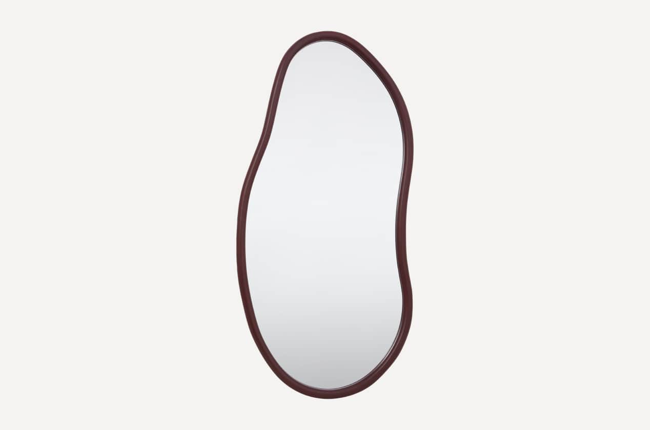 A full-length mirror featuring an irregular, organic silhouette, framed in a dark, possibly wooden,… — 3D model