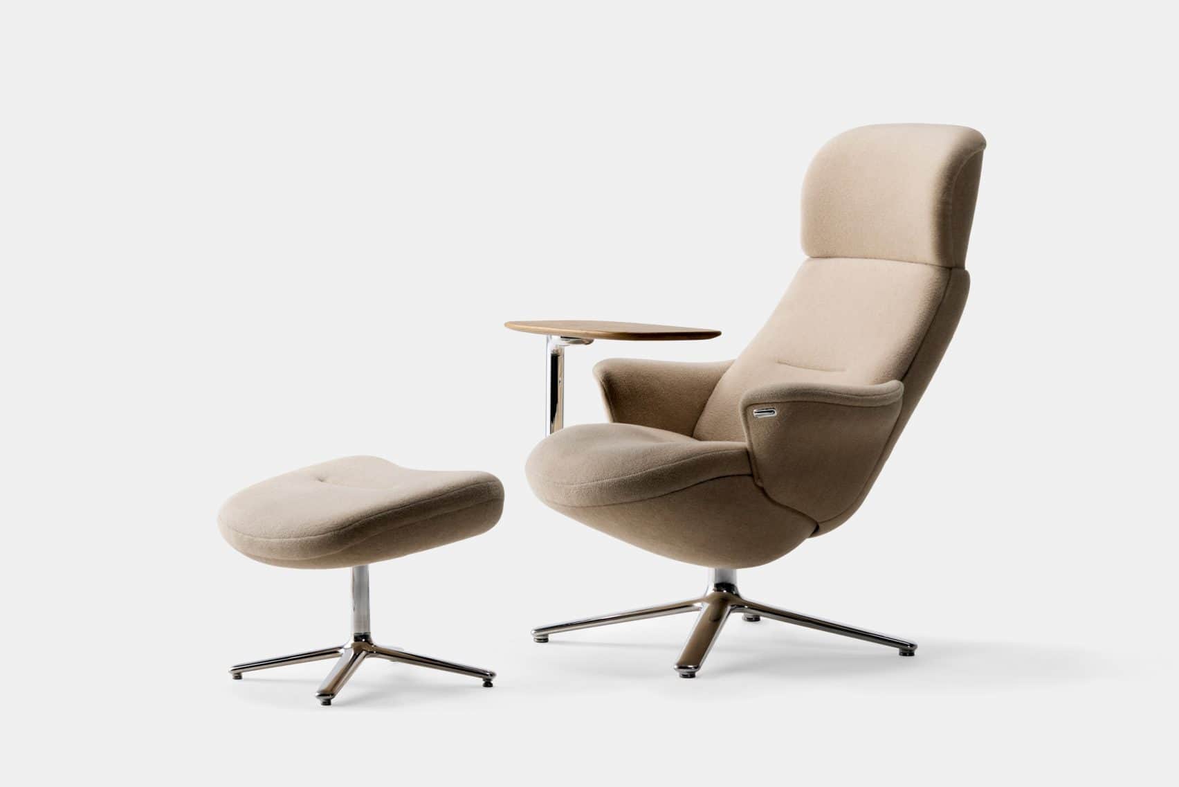 A modern armchair with a high back, upholstered in a textured beige fabric, accompanied by a matchin… — 3D model
