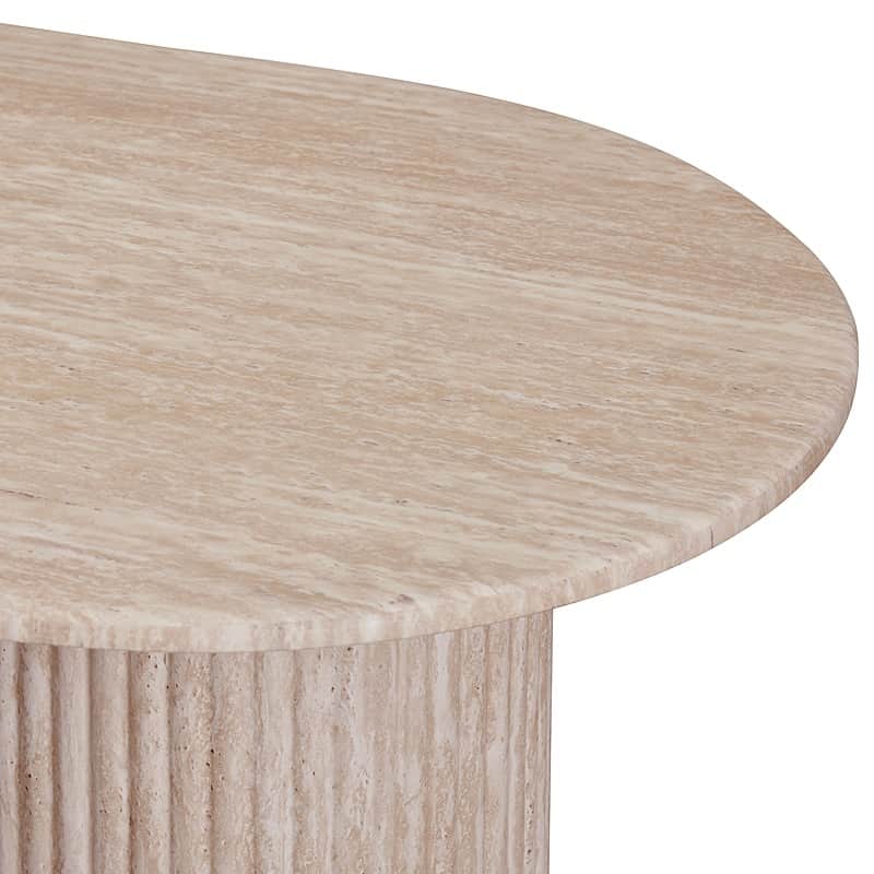 A close-up view of a coffee table with a rounded, possibly oval or kidney-shaped, top made of traver… — 3D model