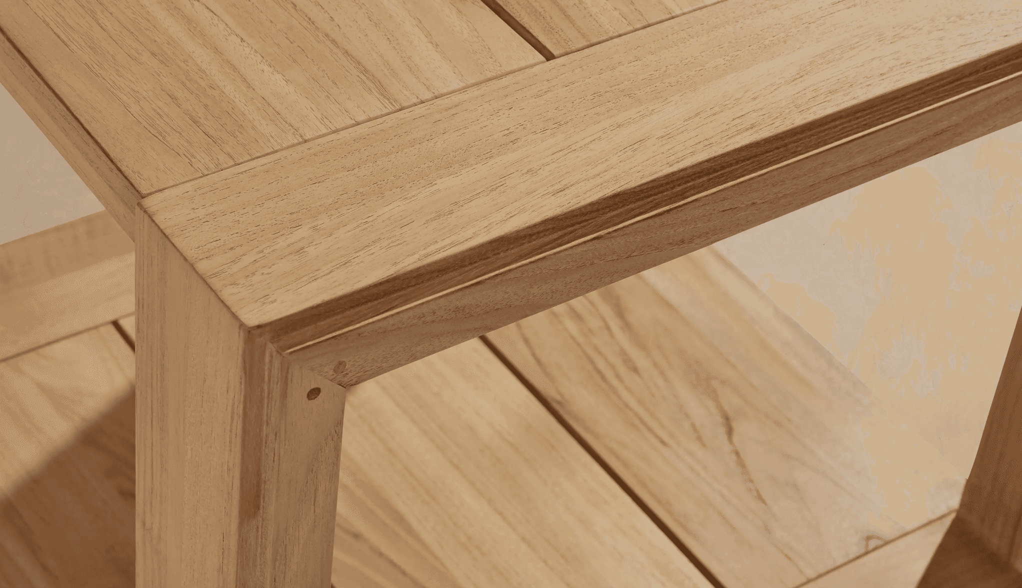 A detailed close-up shot of the corner of a two-tiered console table constructed from light-toned na… — 3D model