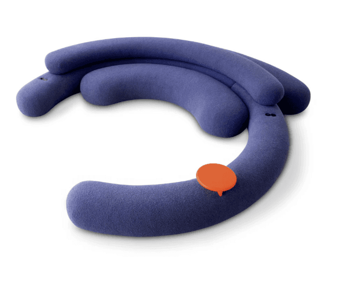 A modular sofa with a curved, organic design. It appears to be upholstered in a soft, textured fabri… — 3D model