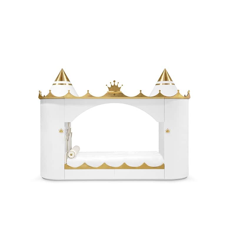 A white bed designed with gold castle-like features, including turrets, battlements, and crown motif… — 3D model