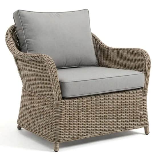 A light brown wicker armchair with light gray cushions. The armchair features a woven rattan or wick… — 3D model
