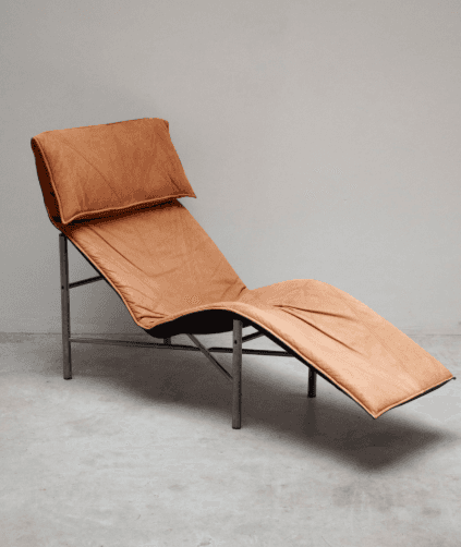 A modern chaise lounge with a thin, tubular metal frame supporting a flexible, reclining seat and ba… — 3D model