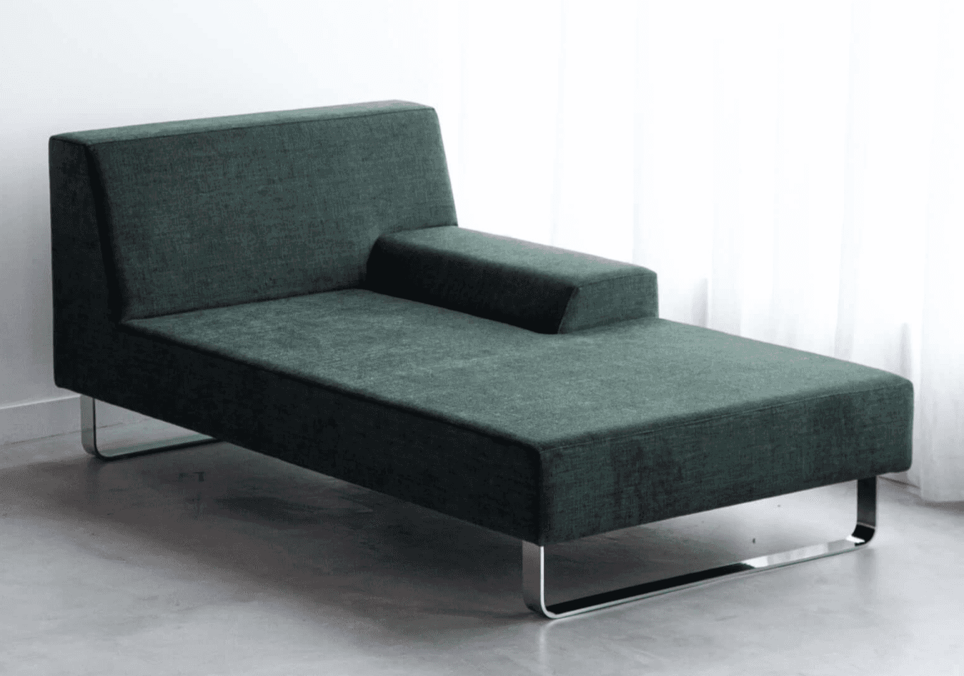 A modern chaise lounge upholstered in a dark green textured fabric. It features a low profile with a… — 3D model