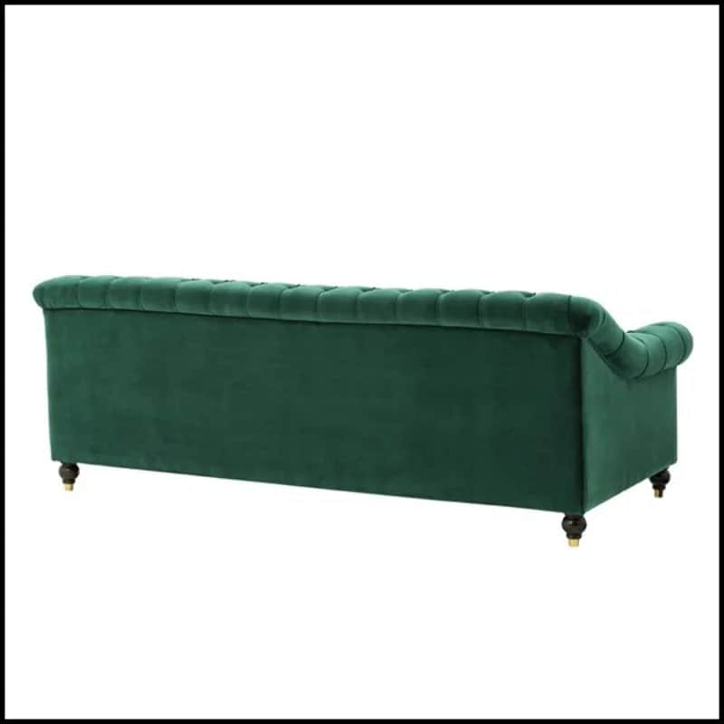 A velvet upholstered sofa with deep button tufting along the back and arms. The sofa features rolled… — free GLTF 3D model
