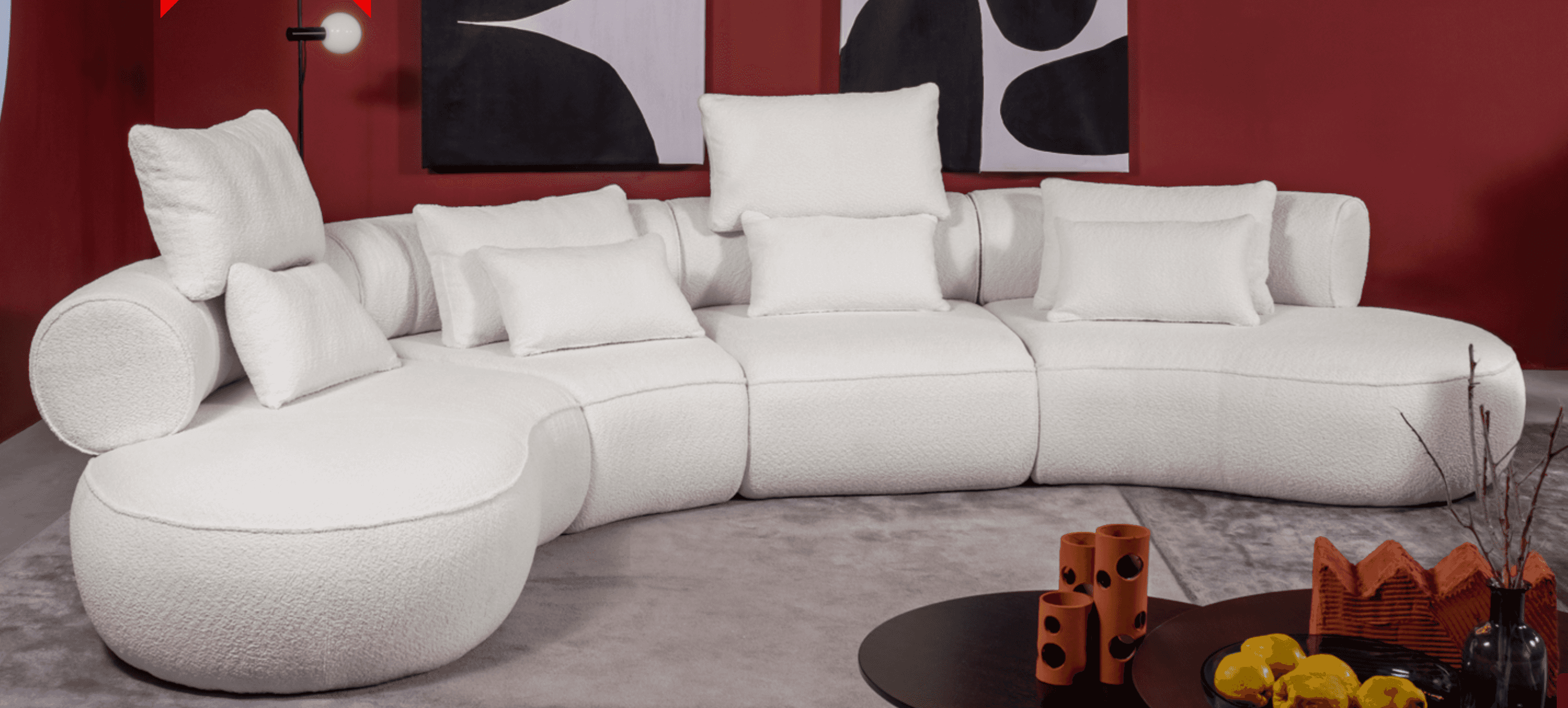 A large, modular, curved sectional sofa with a rounded chaise. The sofa is upholstered in a textured… — 3D model