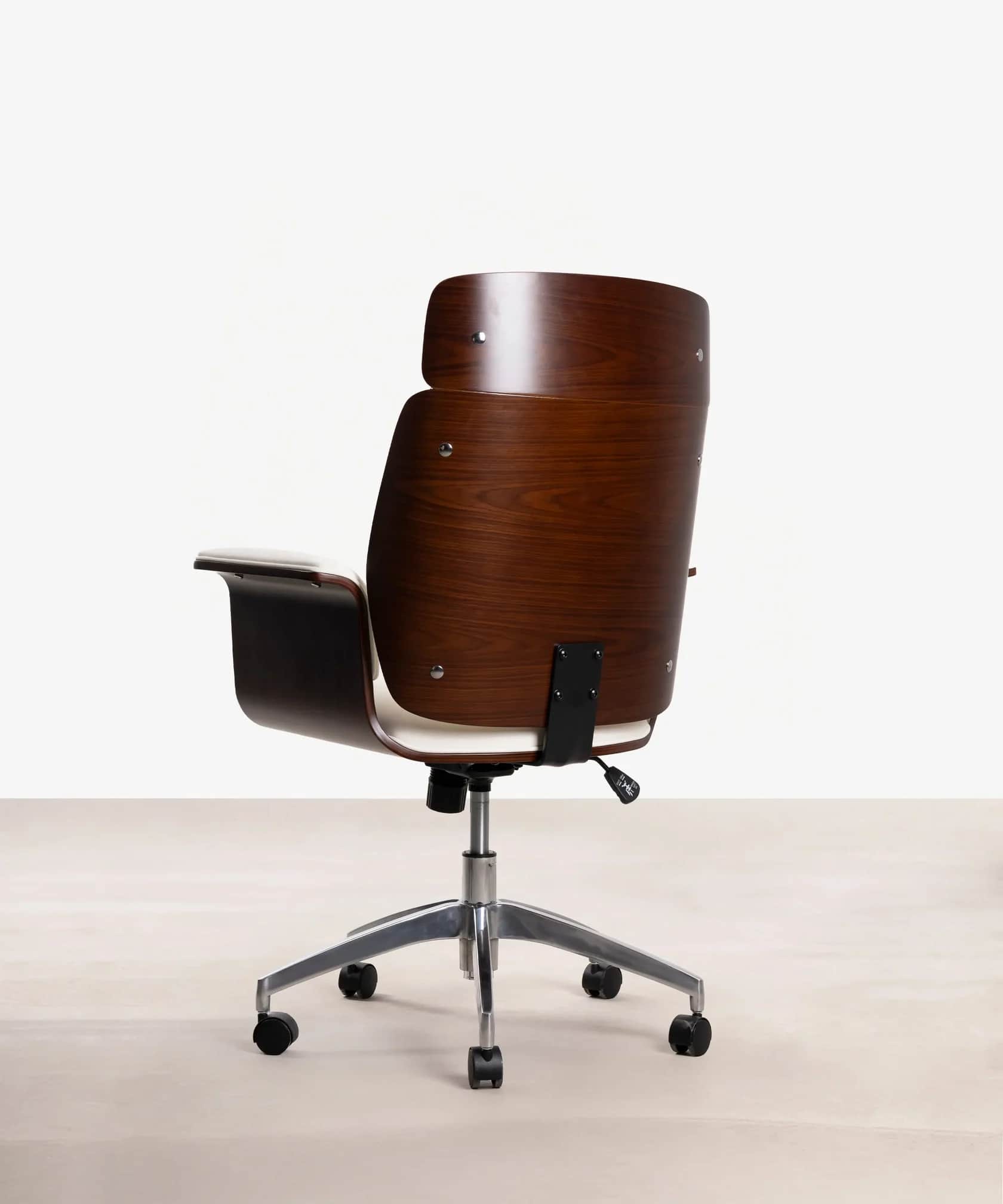 A modern swivel office chair featuring a contoured dark wood veneer shell, white upholstered seating… — 3D model