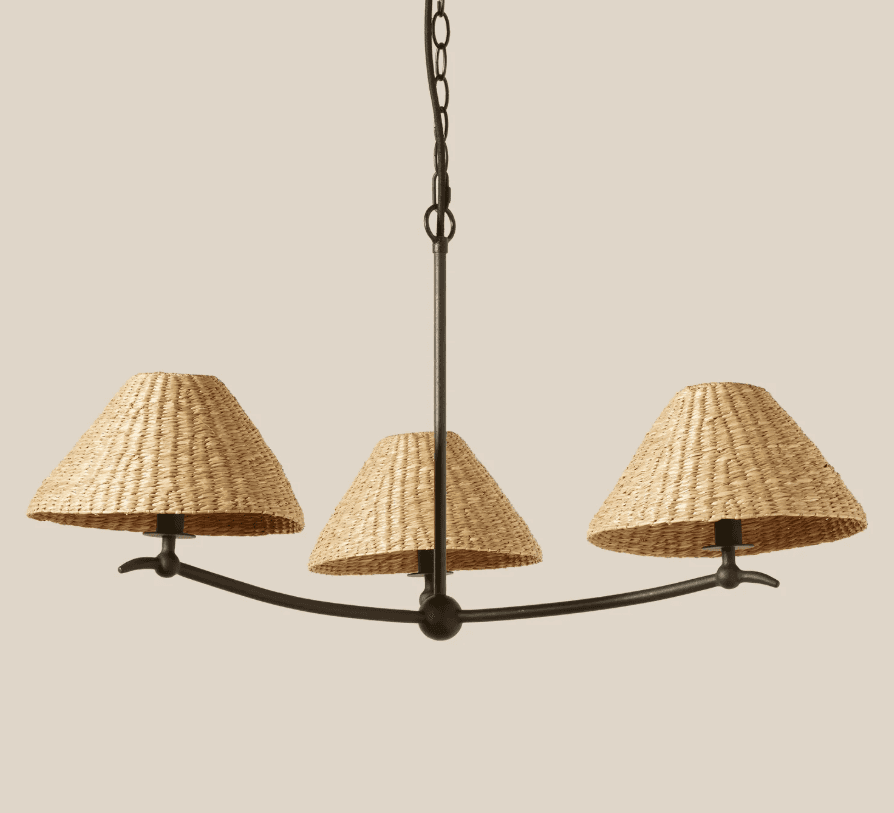 A three-light linear pendant fixture featuring a dark-colored metal frame with a central suspension… — 3D model