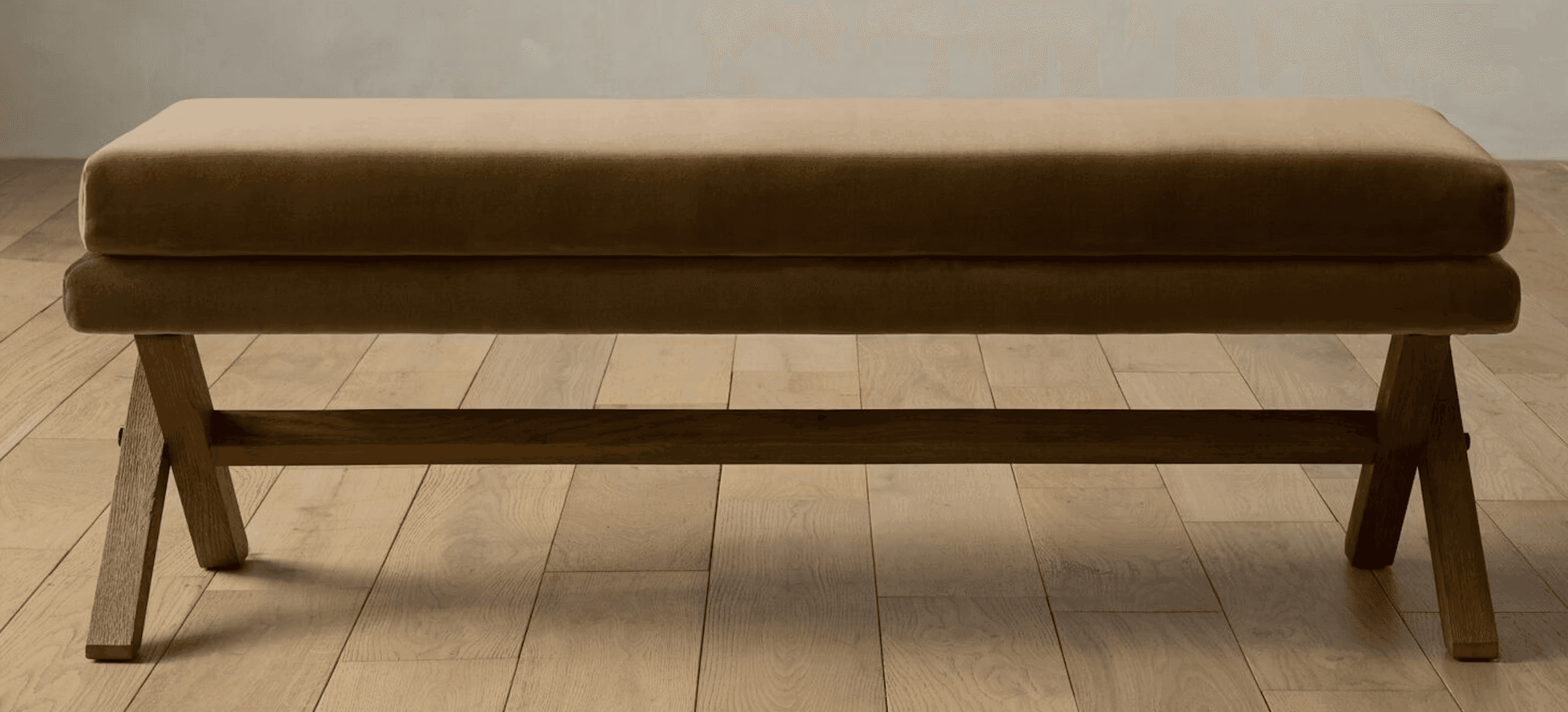 A rectangular bench featuring a thick, upholstered cushion in a beige/tan color supported by a dark… — 3D model