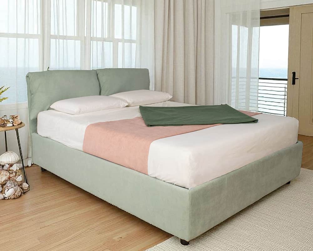A contemporary upholstered platform bed featuring a light green fabric frame and a distinctive headb… — free BLEND 3D model