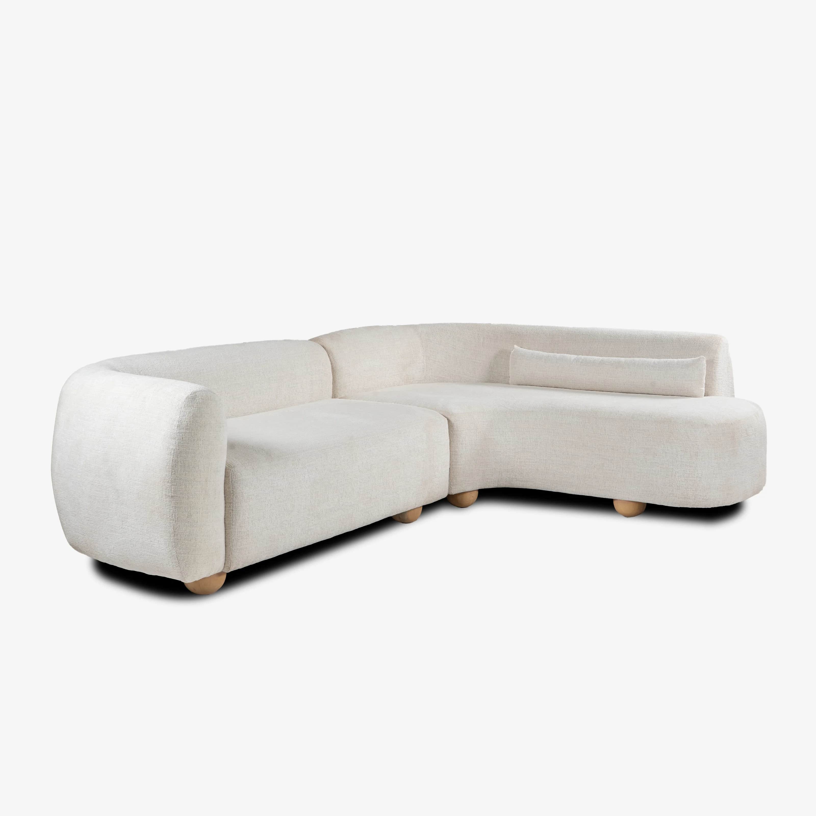 A contemporary L-shaped sectional sofa upholstered in a light cream-colored bouclé fabric. The sofa… — 3D model