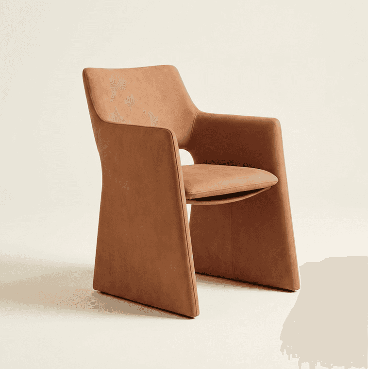 A contemporary armchair with a sculptural, monolithic design, fully upholstered in a smooth, tan-col… — 3D model