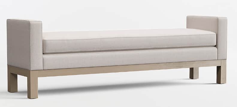 A contemporary upholstered bench with rectangular block arms and an exposed wooden base. The bench f… — 3D model