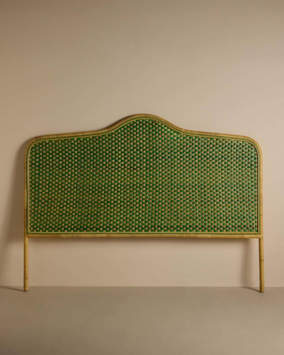 A headboard featuring a natural light wood or rattan frame with an irregularly curved top edge, enco… — 3D model