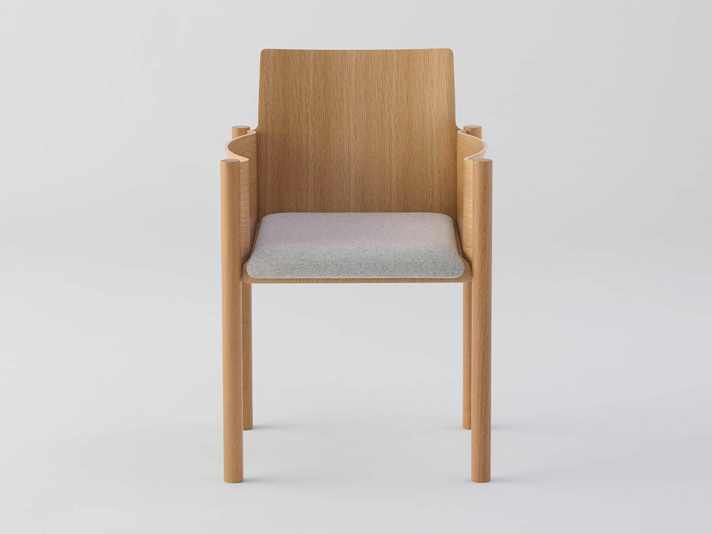A contemporary armchair crafted from light-toned wood, featuring a flat wooden backrest, distinctive… — 3D model