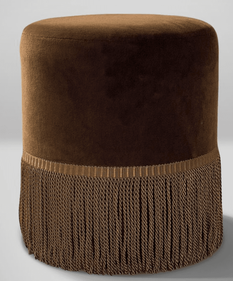 A cylindrical upholstered stool featuring plush brown velvet upholstery and a decorative fringe arou… — 3D model