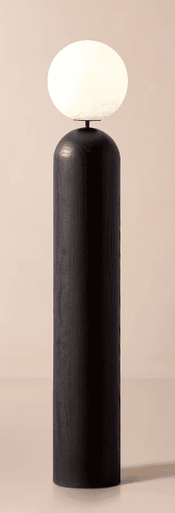 A minimalist modern floor lamp featuring a tall, cylindrical base made of dark stained wood, topped… — 3D model