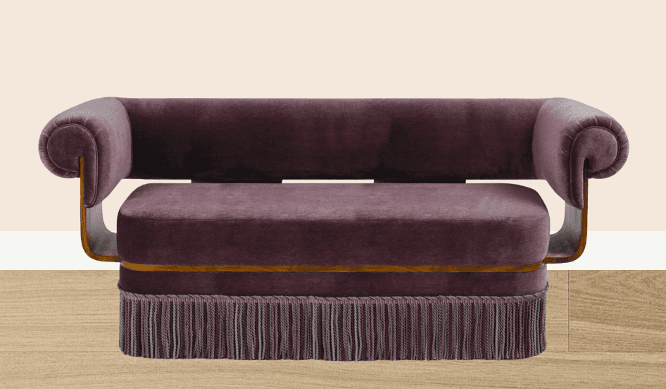 A plush, upholstered sofa with a deep purple velvet fabric. It features rolled arms with a distinct,… — free GLTF 3D model