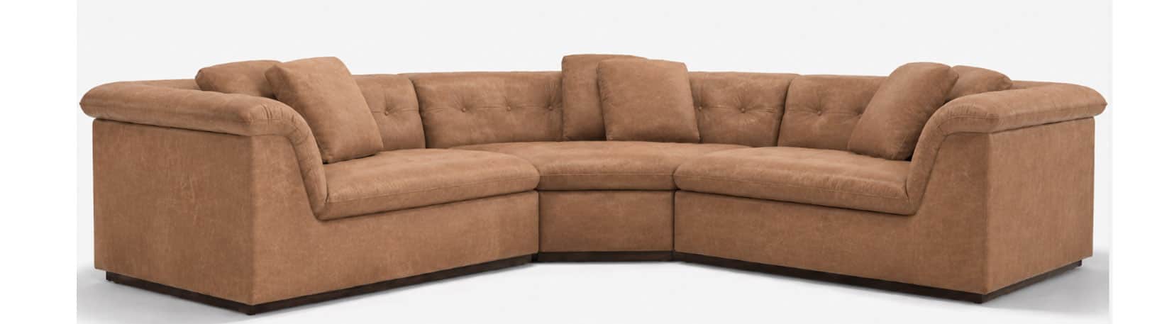 An L-shaped sectional sofa upholstered in a light brown, distressed faux-leather material. The sofa… — 3D model