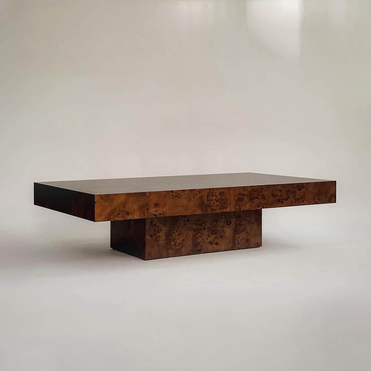 A rectangular coffee table made from burled wood, likely burl walnut veneer, with a thick top restin… — free BLEND 3D model