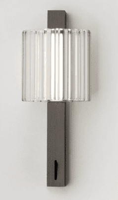 A modern wall sconce featuring a rectangular dark-finished metal backplate and a clear fluted glass… — 3D model