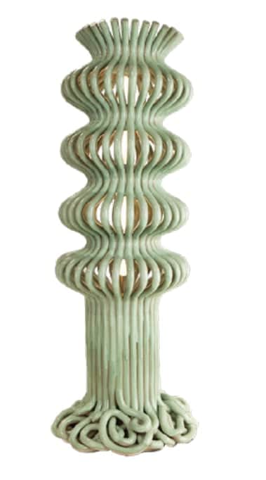 A tall, slender floor lamp crafted from rattan, featuring an undulating, wavy profile painted in a s… — 3D model