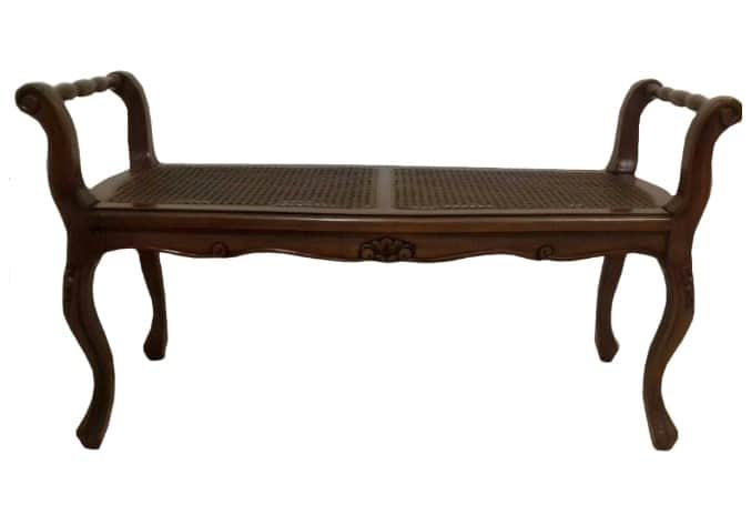 A classic French Provincial style bench featuring a dark stained wooden frame with intricate carving… — 3D model