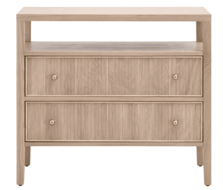 A light-toned wooden nightstand or small accent cabinet featuring two drawers with reeded fronts and… — 3D model