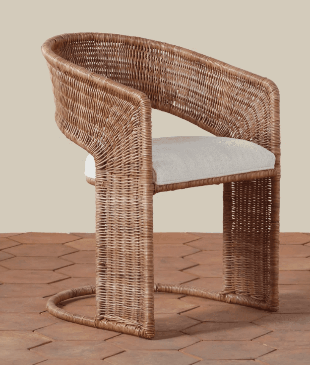 A contemporary accent chair featuring a full woven rattan construction in a natural light brown hue.… — free OBJ 3D model