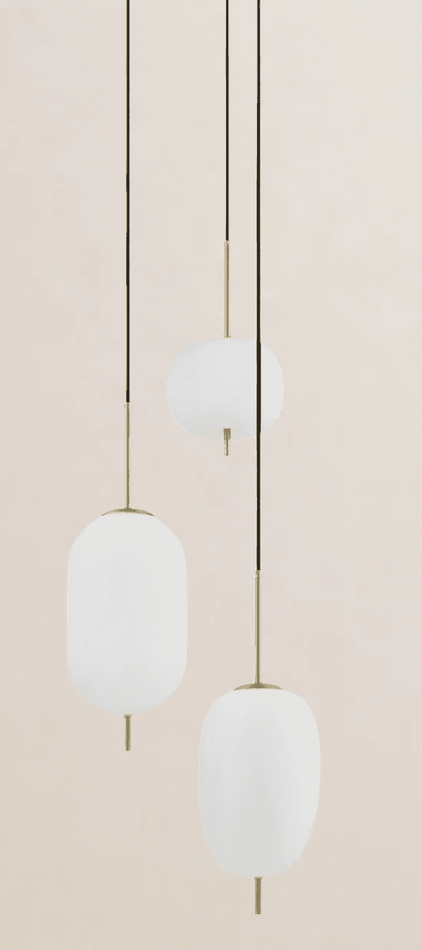 A set of three modern pendant lights featuring white opalescent glass shades of varying elongated an… — 3D model