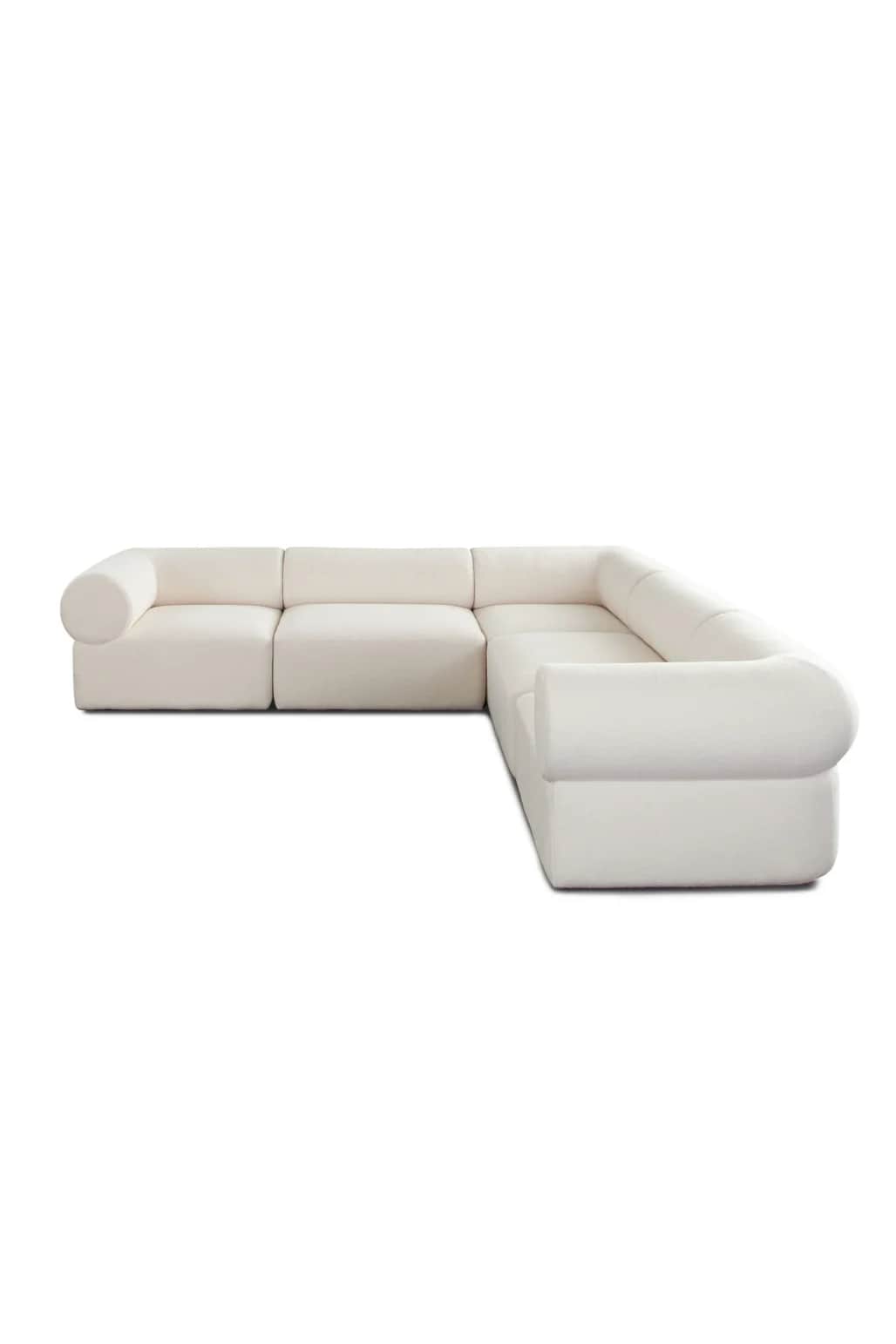 An L-shaped modular sectional sofa upholstered in an ivory or off-white textured fabric, likely bouc… — 3D model