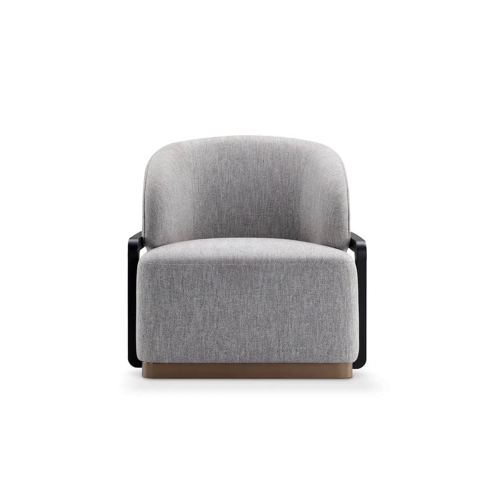 A contemporary armchair with a rounded back and upholstered seat and backrest. The armchair features… — 3D model
