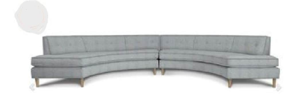 A light grey, two-piece curved sectional sofa featuring a low profile, button-tufted backrests, and… — 3D model