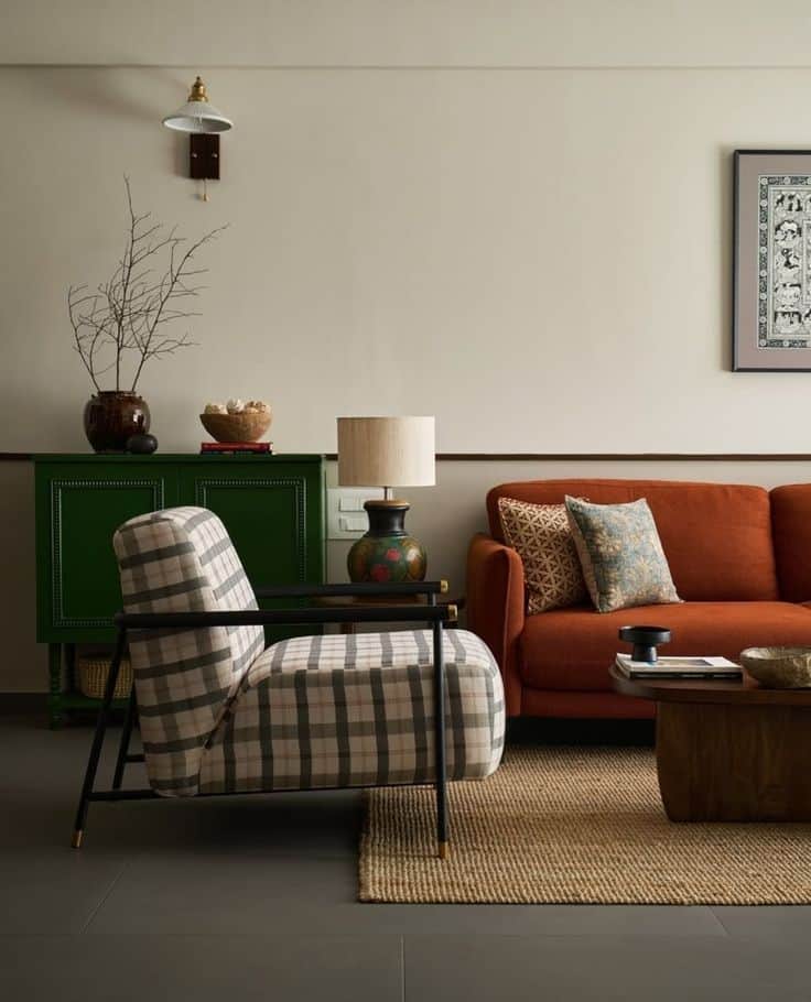 A modern lounge chair featuring plush plaid upholstery in neutral tones and a minimalist black metal… — free OBJ 3D model