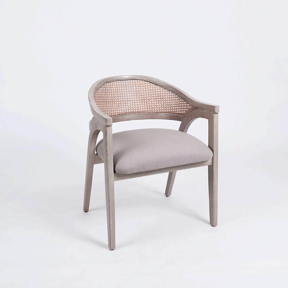 A transitional armchair featuring a light-toned wooden frame with a curved silhouette, integrated ar… — free OBJ 3D model