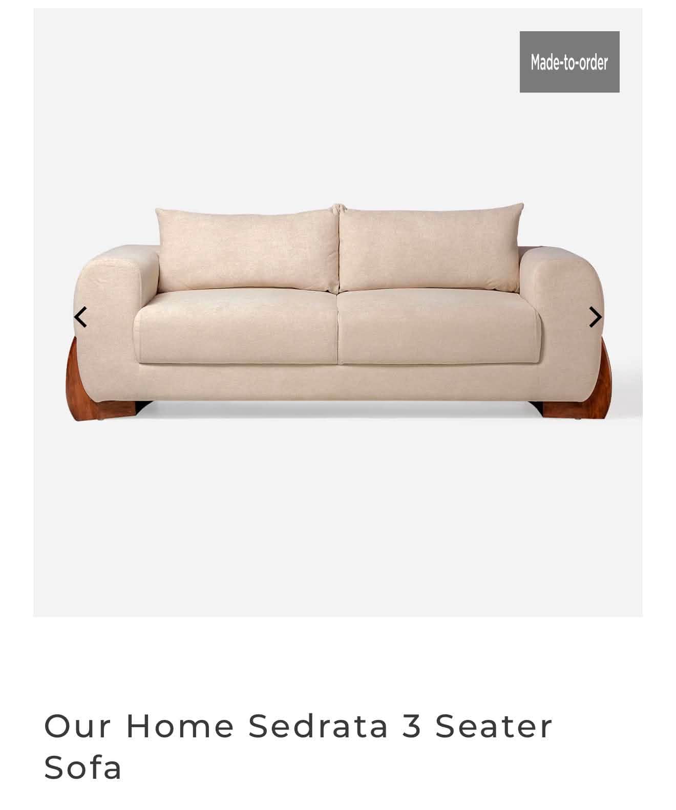 A modern two-seater sofa featuring light beige fabric upholstery and distinctive dark wood paneling… — 3D model