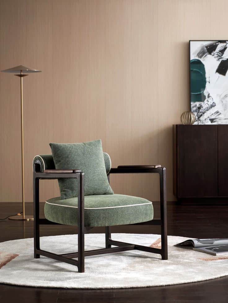 A modern lounge chair featuring a dark-stained exposed wood frame, upholstered in a green textured f… — 3D model