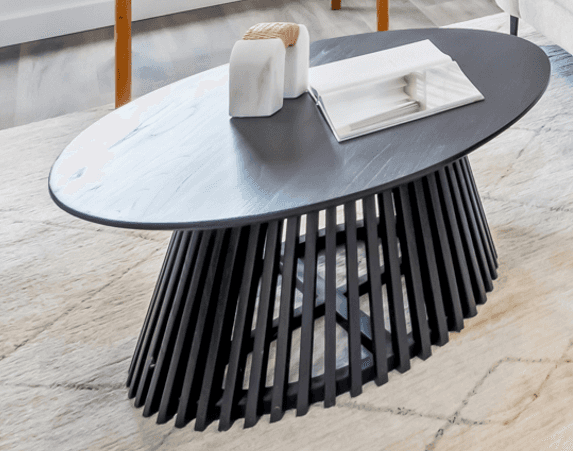 A modern black oval coffee table featuring a sculptural base composed of numerous vertically oriente… — 3D model