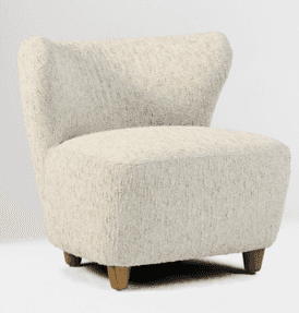 A cream-colored, textured armchair with a high, curved back and sloping arms. It features four short… — free OBJ 3D model