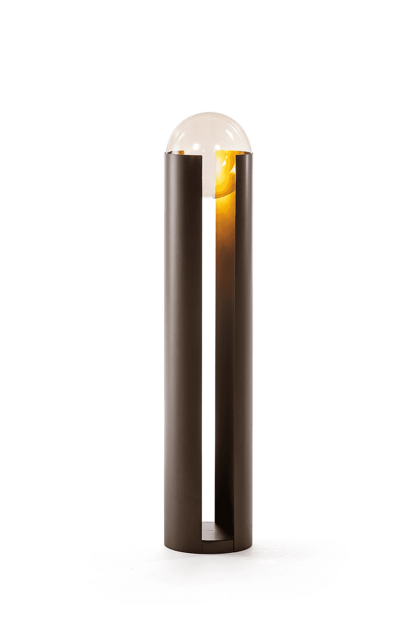 A modern, minimalist floor lamp featuring a tall, cylindrical body made of dark metal. A vertical sl… — 3D model