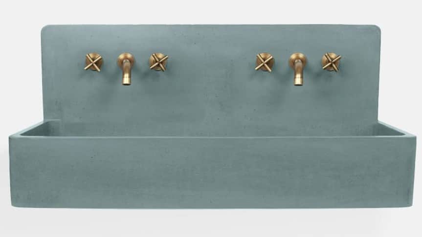 A modern, minimalist wall-mounted sink unit made of blue-gray concrete, featuring a double basin tro… — 3D model