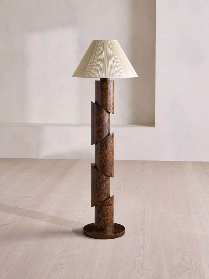 A tall floor lamp featuring a distinctive segmented and slightly spiraled stem made from burled wood… — free STL 3D model